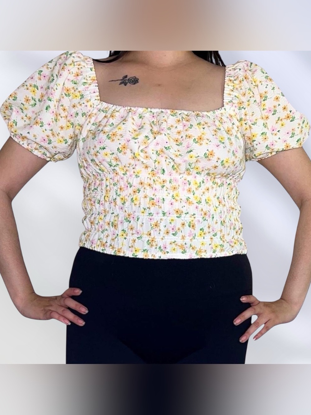 Elodie White floral smocked top.